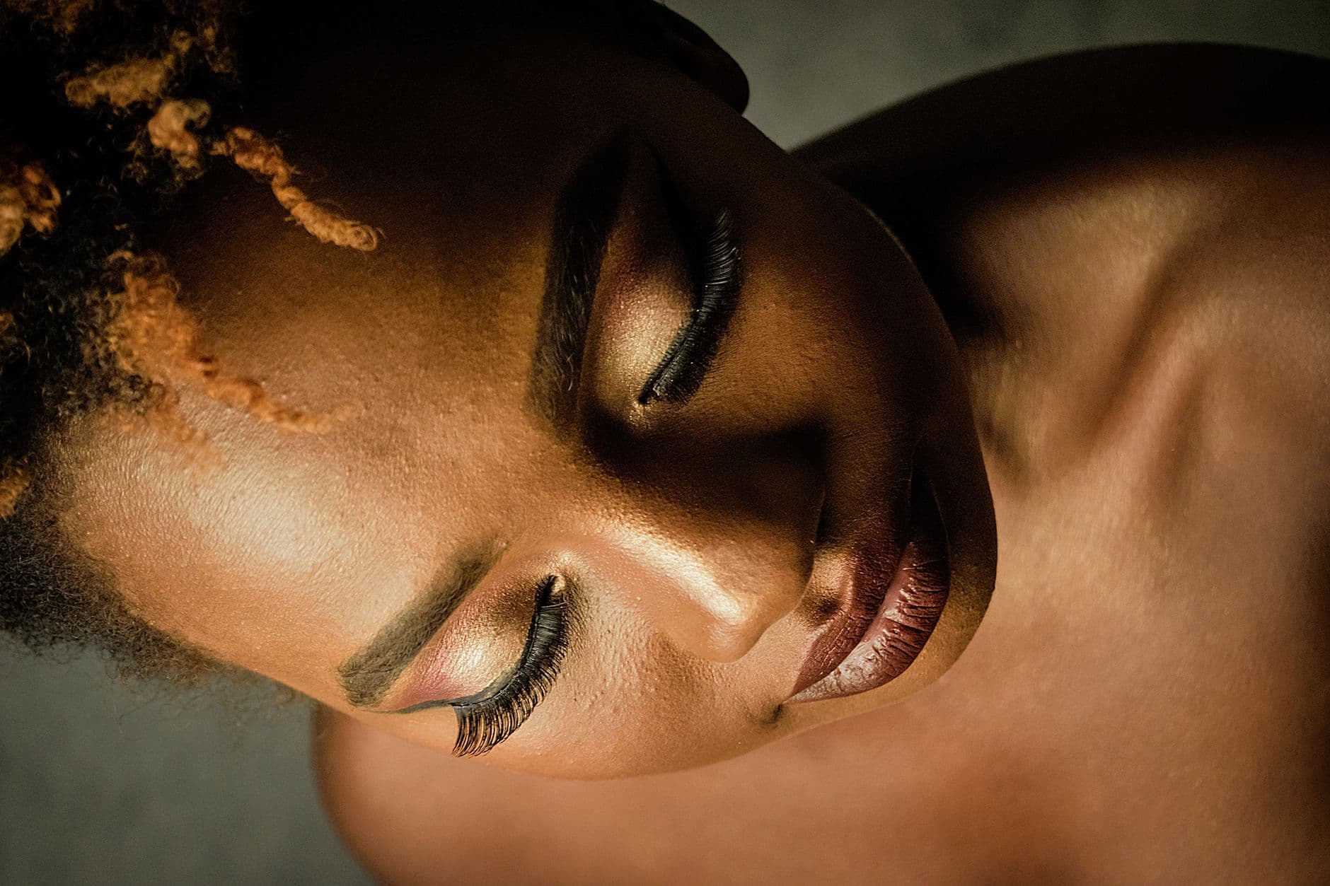 Close-up of a Black woman with classic fusion eyelash extensions